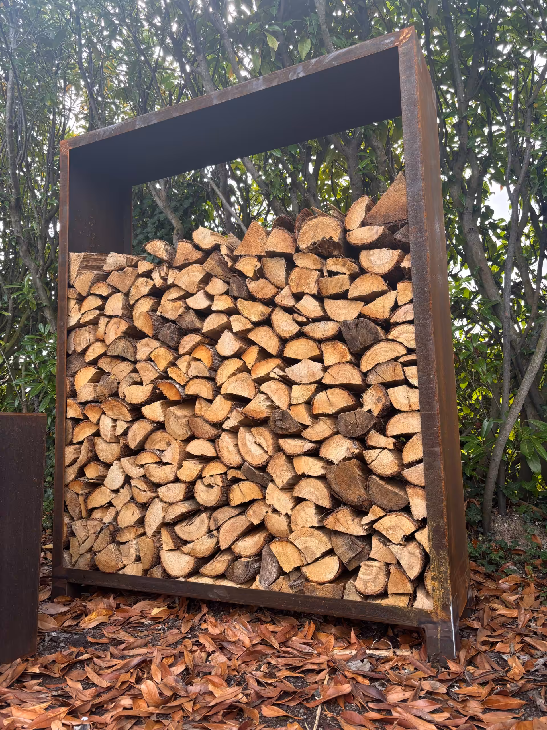 range bûches extérieur en corten