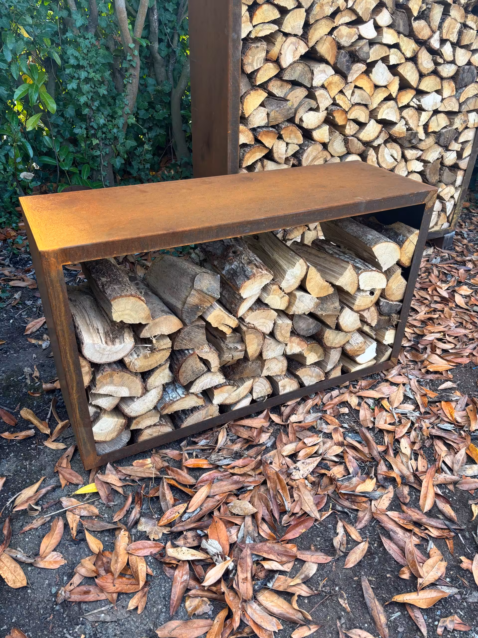 range bûches extérieur en corten