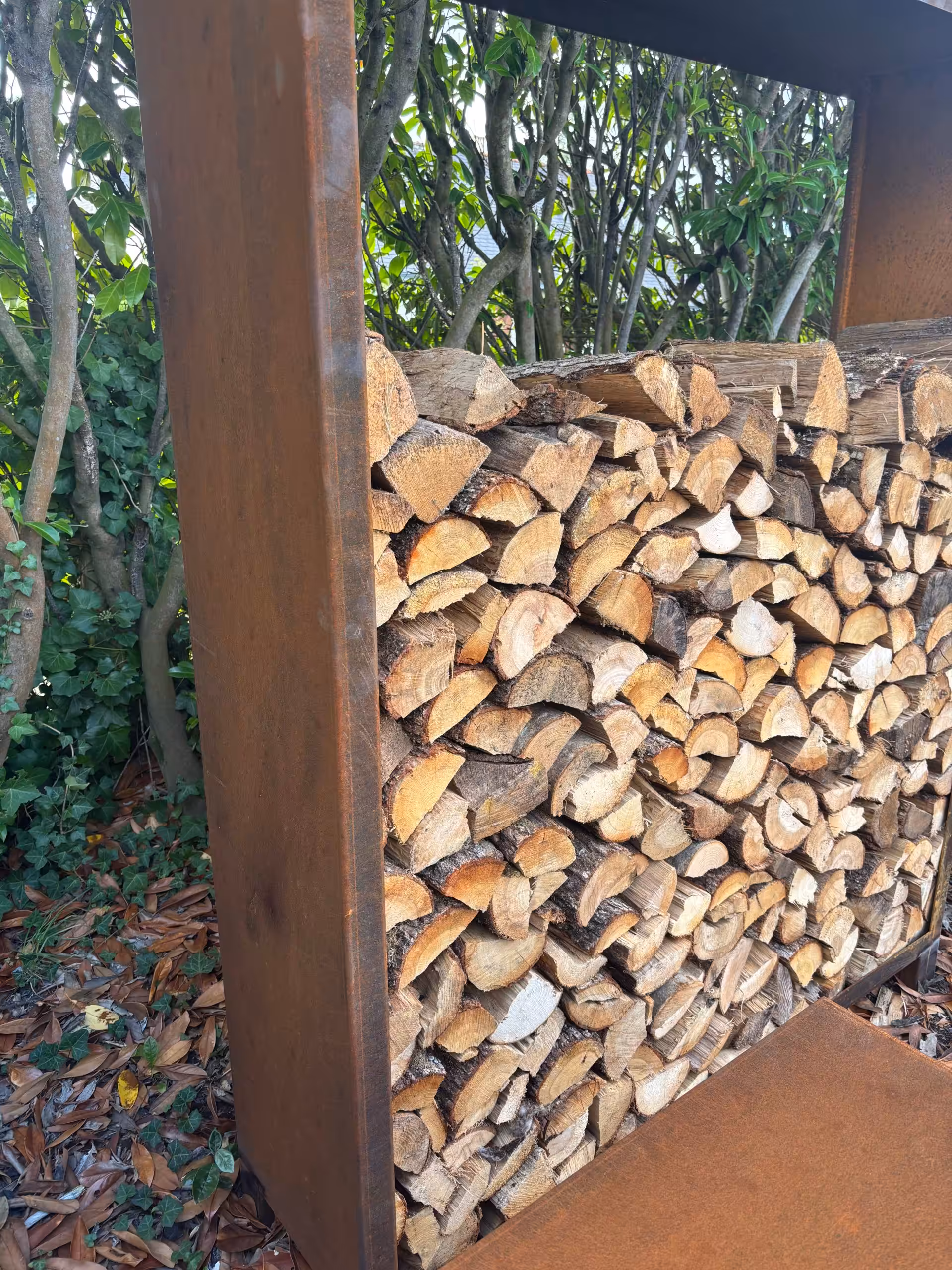 range bûches extérieur en corten
