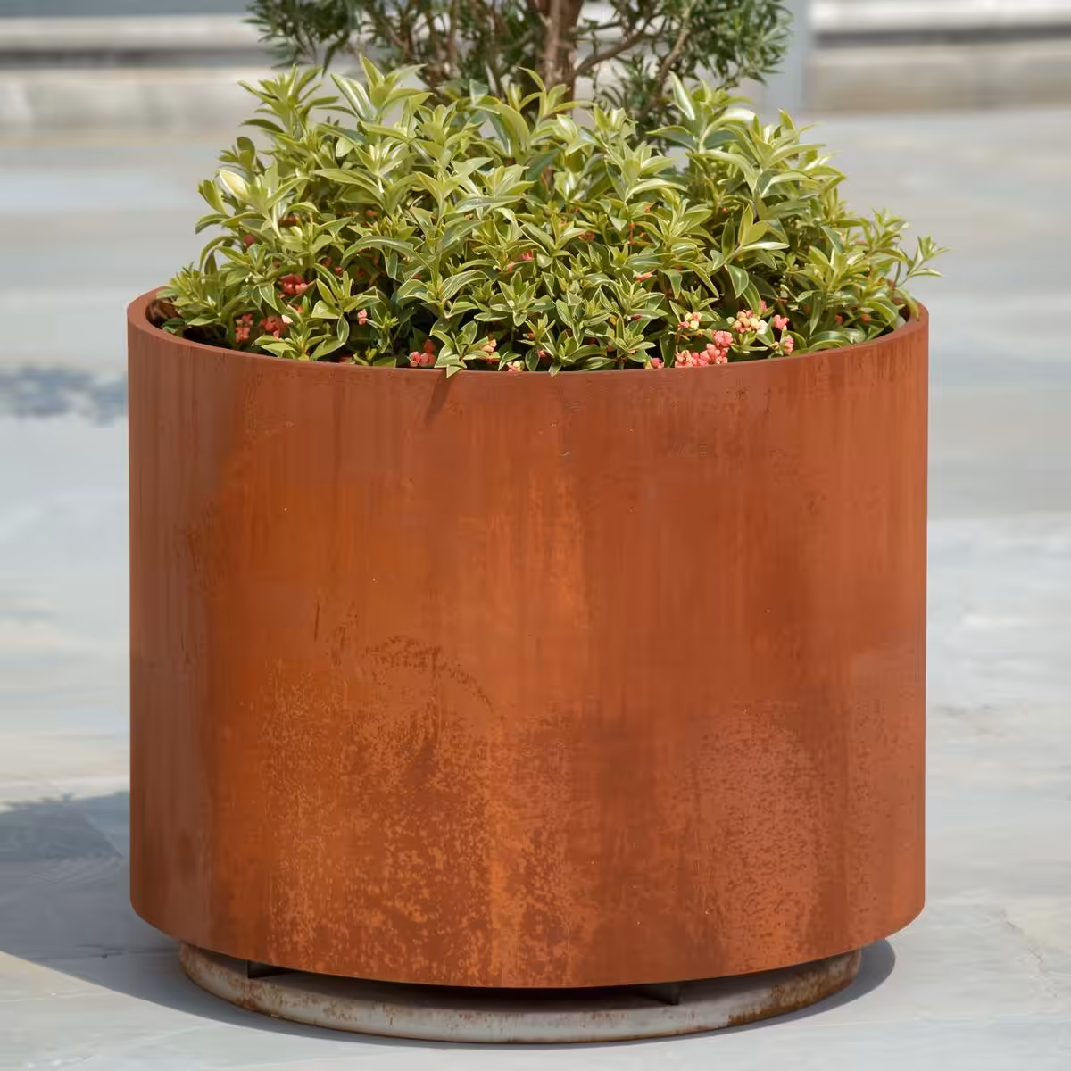 jardinière ronde en acier corten sur mesure avec socle